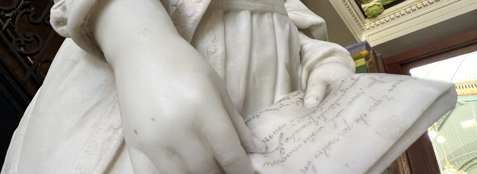 close up photo of a statue in the library