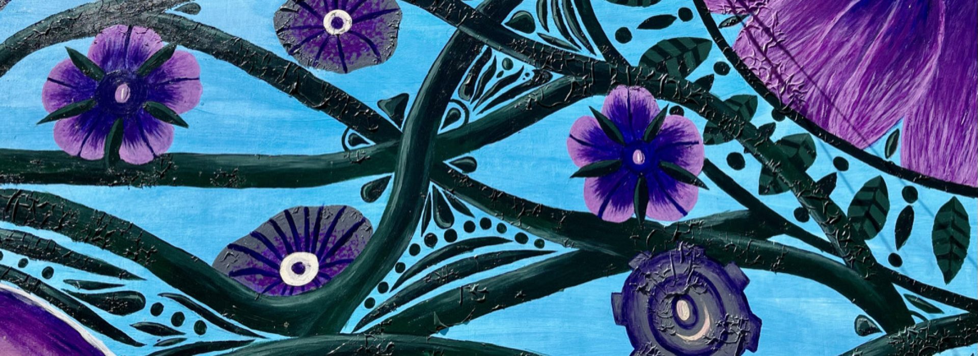 close up of a painting of flowers and vines